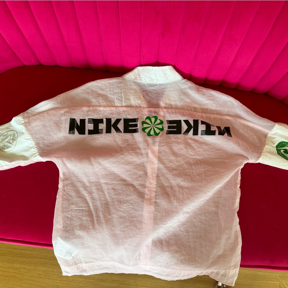 Exclusive Nike running top in small
